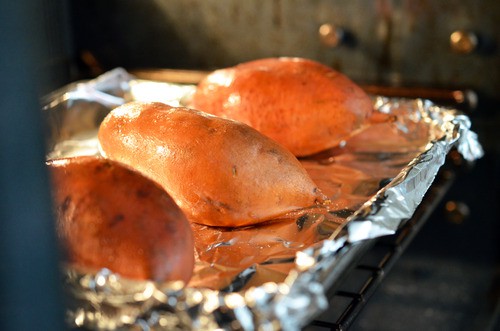 Sweet potatoes baking in oven